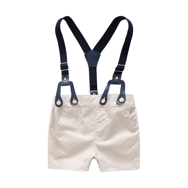 Beige shorts with navy blue suspenders on a white background