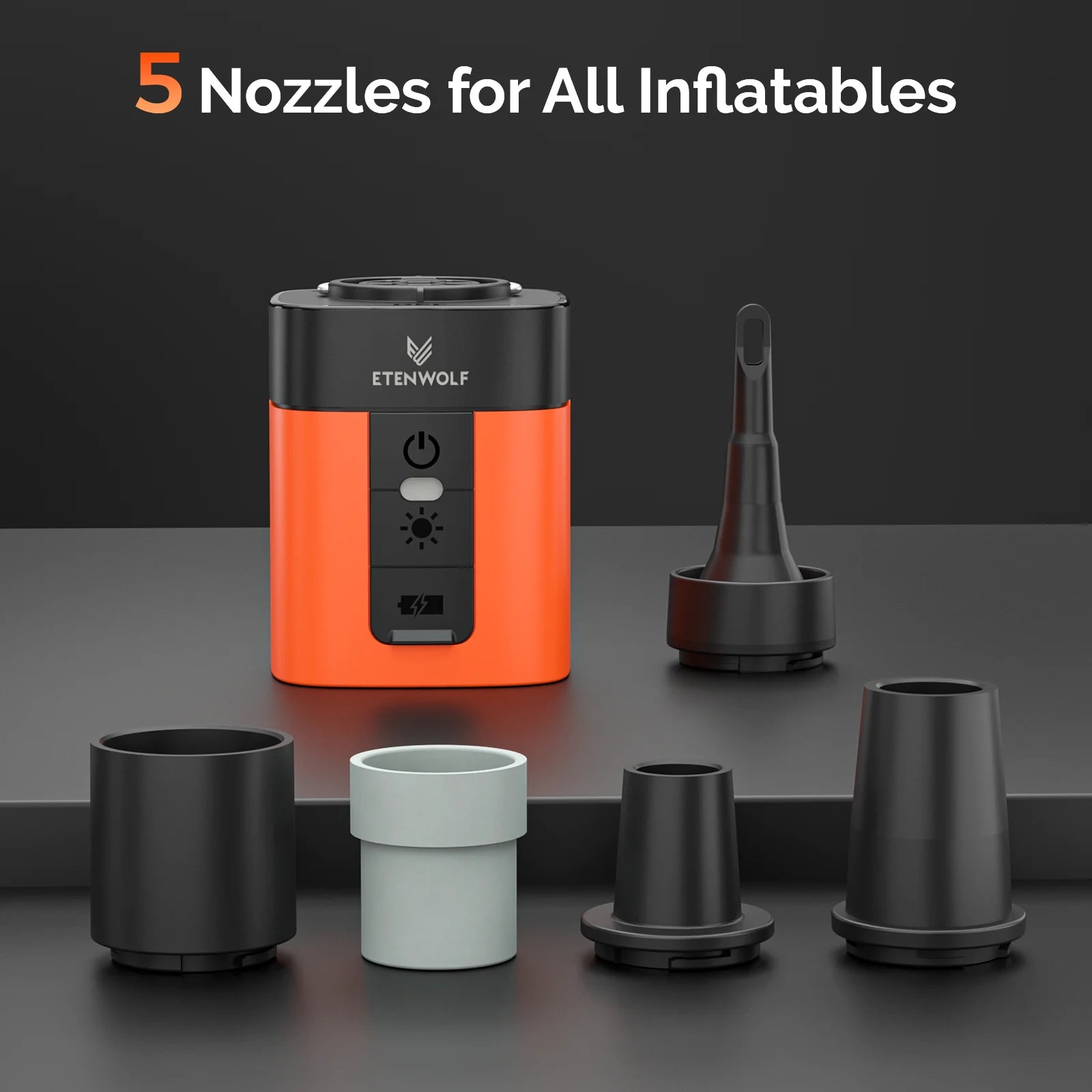 Orange and black device with multiple nozzles on a dark background