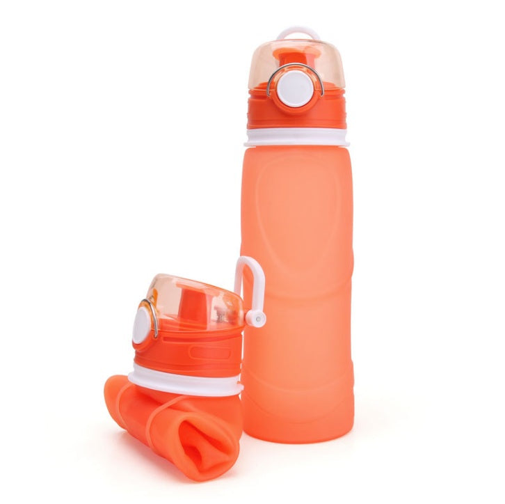 Orange collapsible water bottle with white accents on a white background