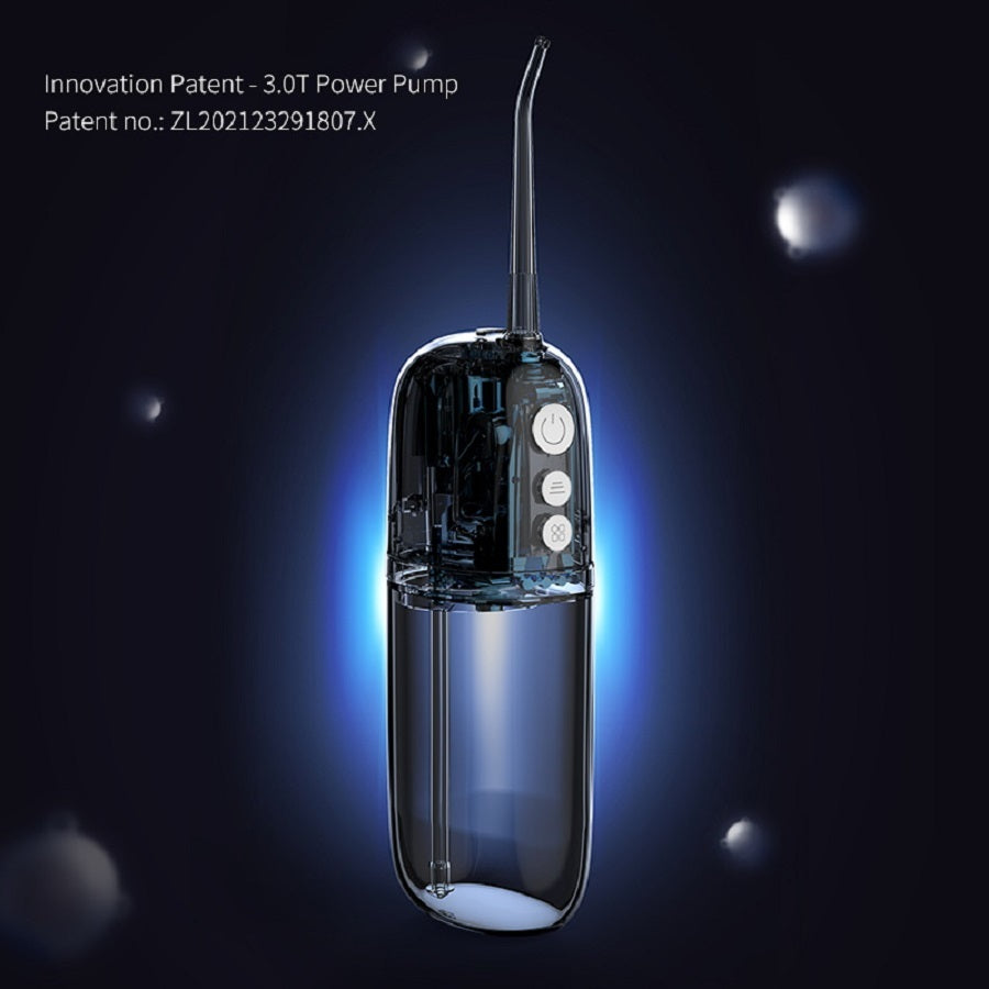 Water flosser device with blue light on a dark background
