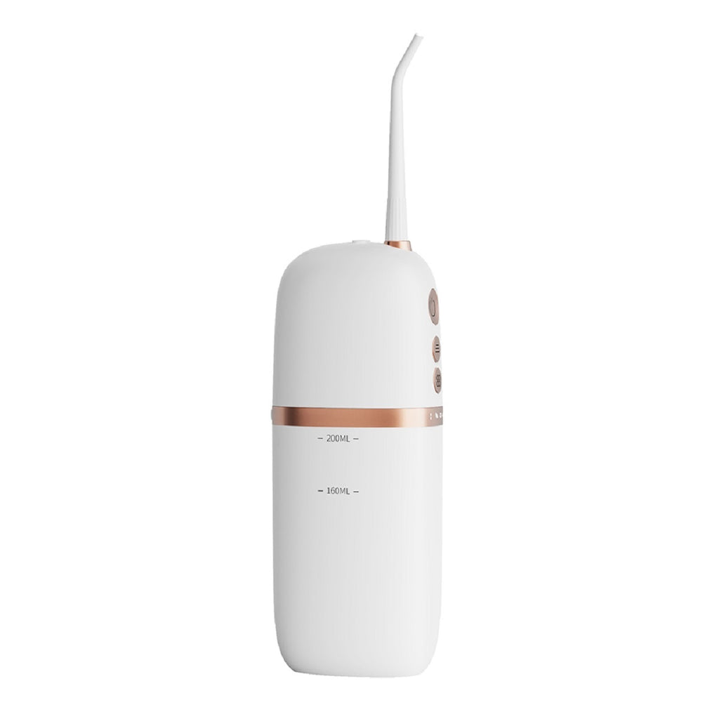 White and rose gold dental water flosser on a white background