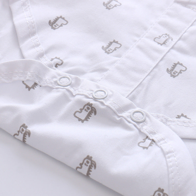 White fabric with embroidered patterns on a white background