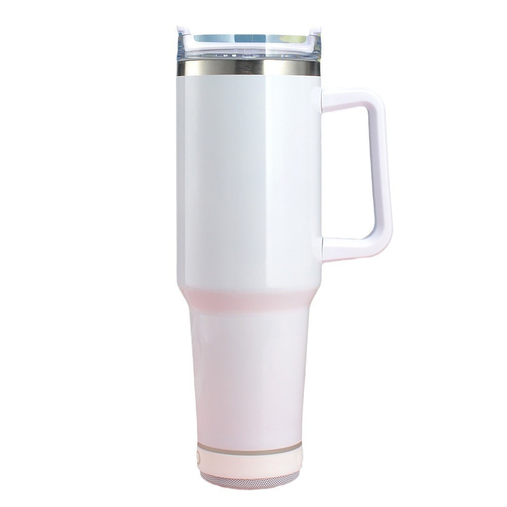 White travel mug with a clear lid on a white background