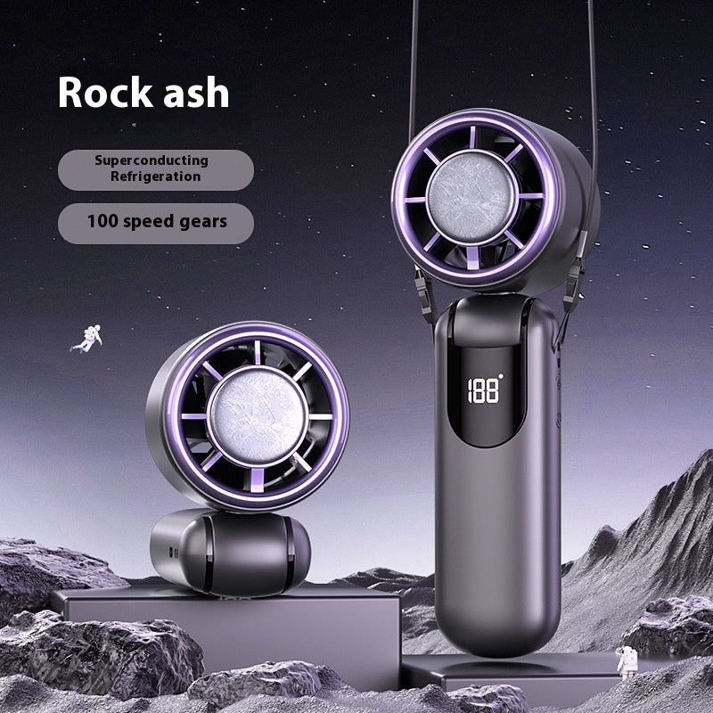 dark purple Handheld fan with cooling system on a rocky landscape background